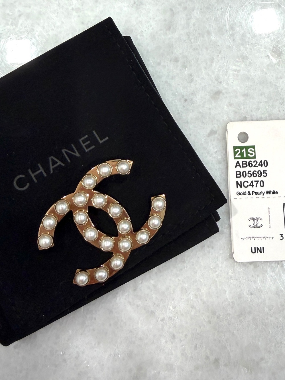 Chanel pearl brooch